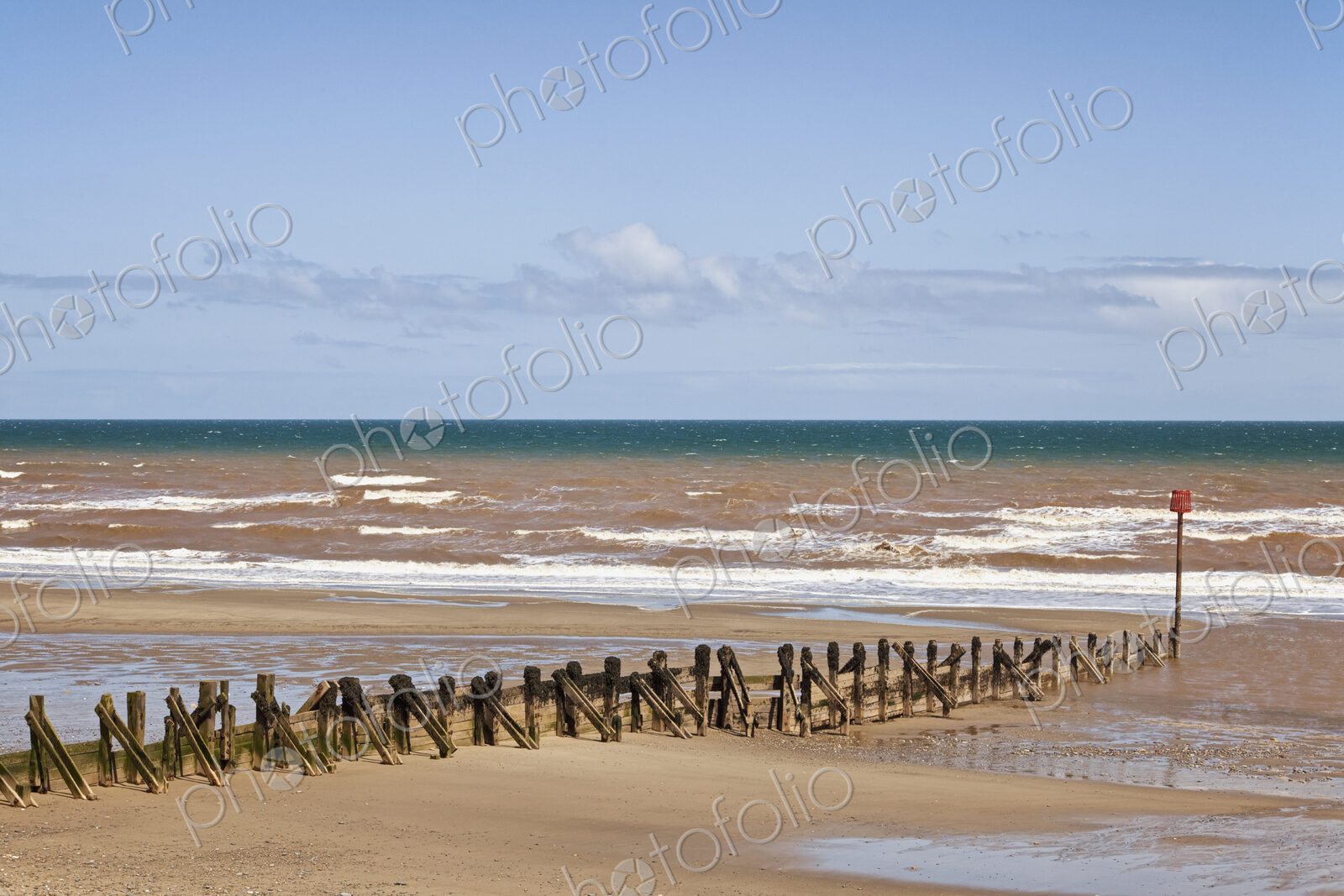 Pilings on Beach