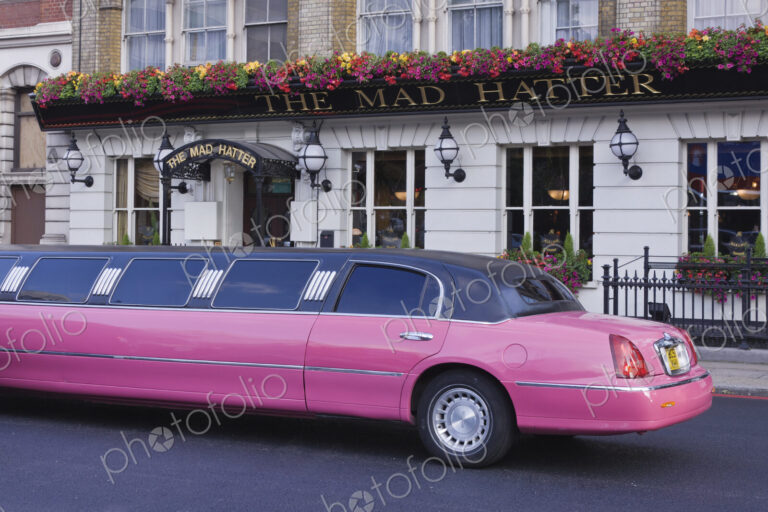 Pink Limo Outside a Pub