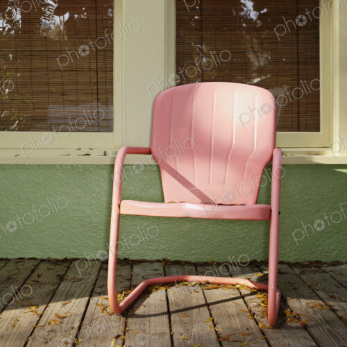 Pink Metal Chair on a Porch Pink Metal Chair on a Porch