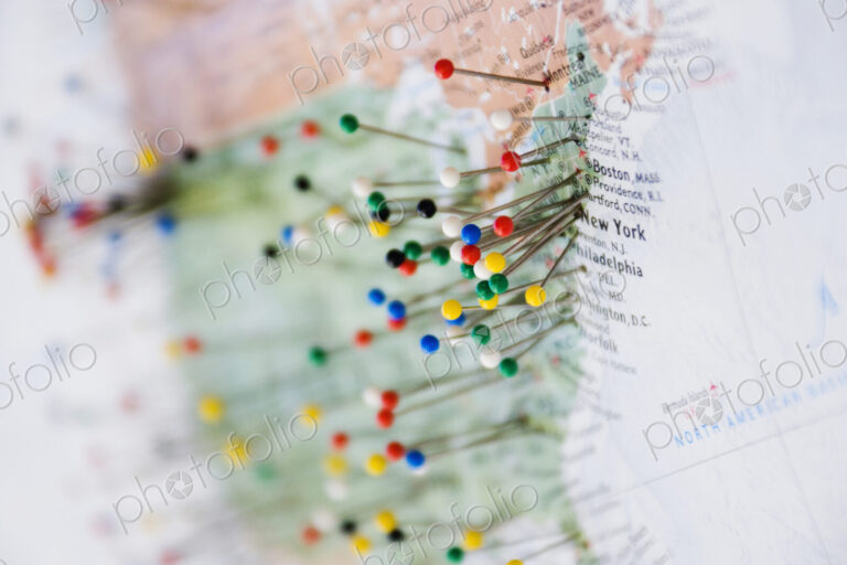 Pins in Map of US and Canadian Border