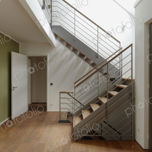 Planks, a wooden floor and staircase in home