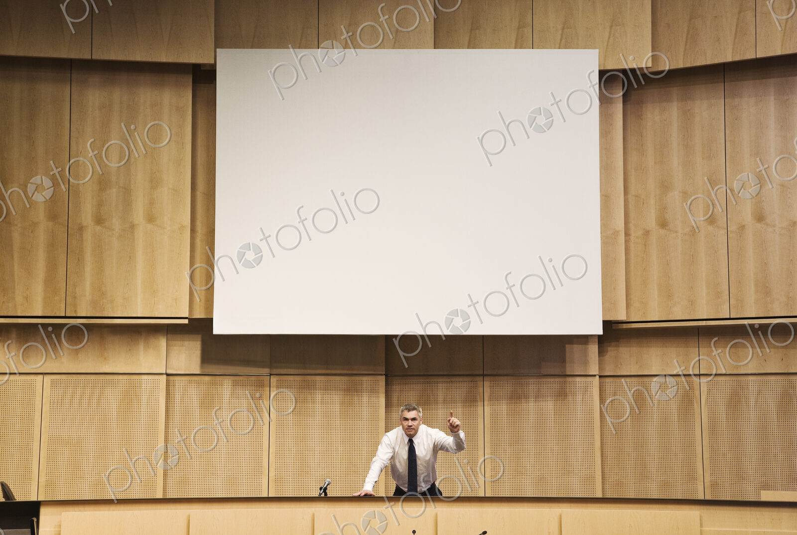Politician making a speech at a political meeting.
