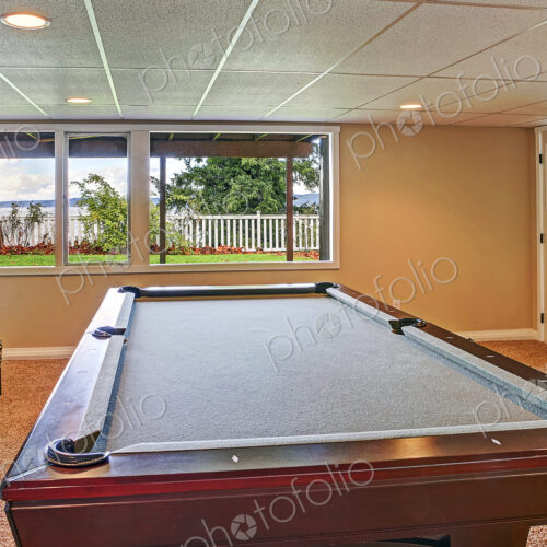 Pool table in game room Pool table in game room