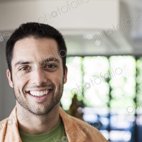 Portrait of Hispanic man at home.