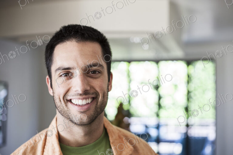 Portrait of Hispanic man at home.