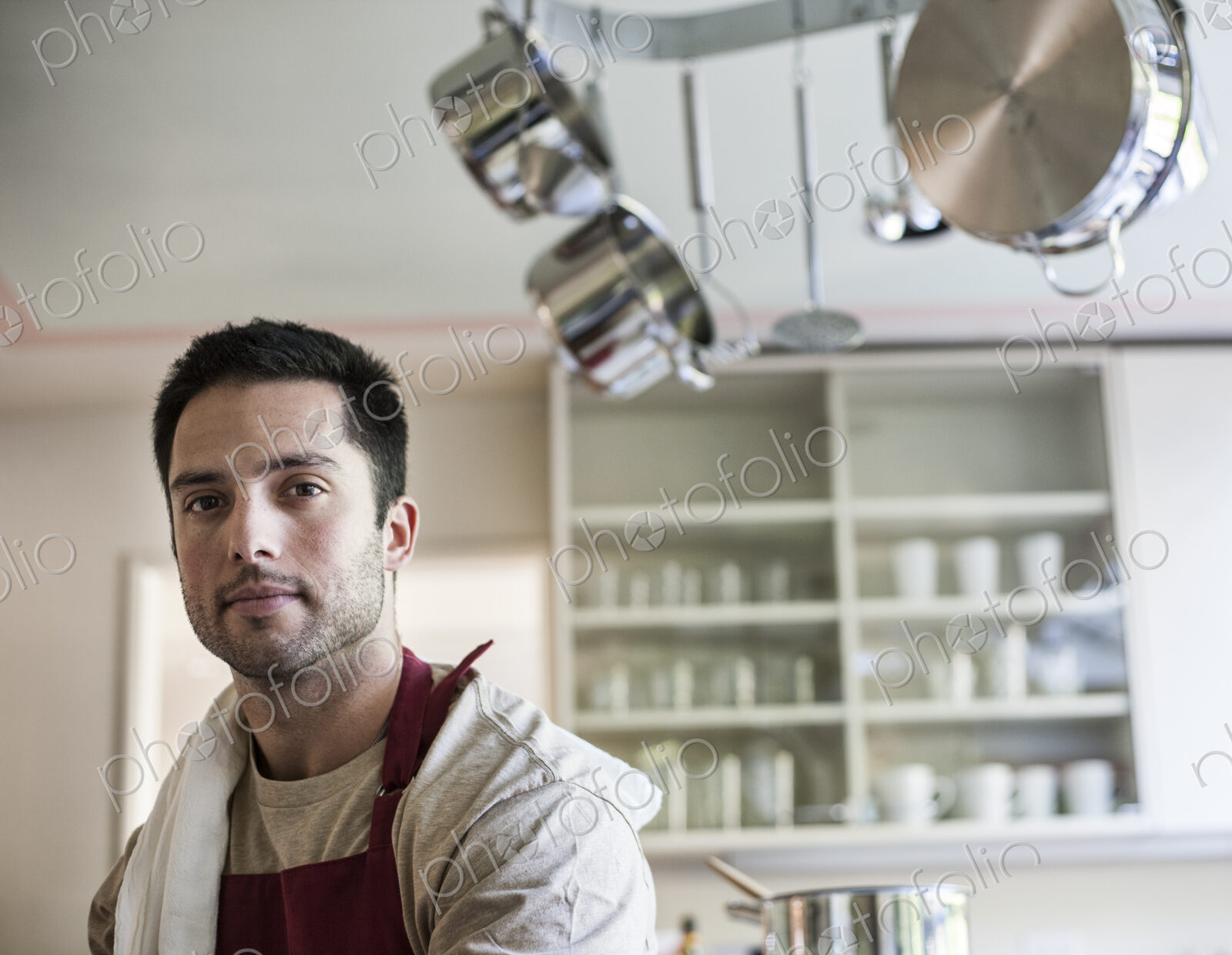 Portrait of Hispanic man at home.