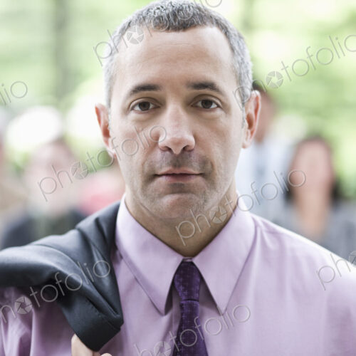 Portrait of a Caucasian businessman in the lobby of a convention center. Portrait of a Caucasian businessman in the lobby of a convention center.