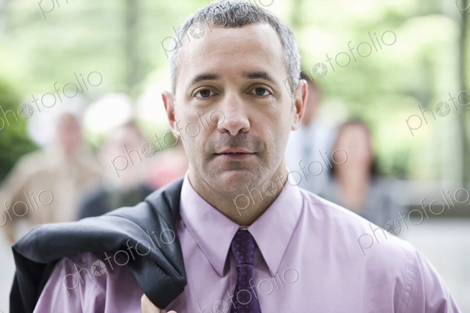Portrait of a Caucasian businessman in the lobby of a convention center.