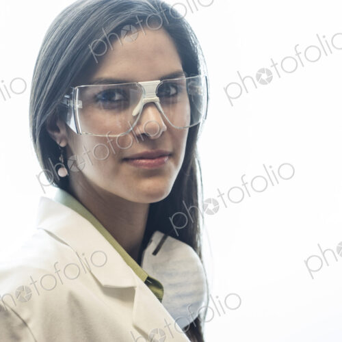 Portrait of a Hispanic female dentist in her office. Portrait of a Hispanic female dentist in her office.