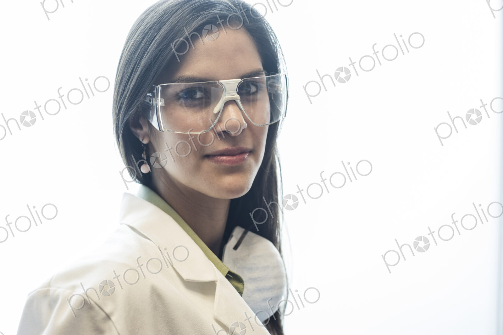 Portrait of a Hispanic female dentist in her office.