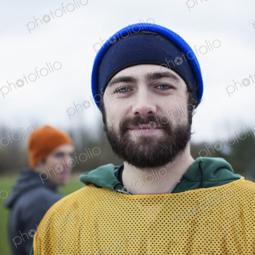Portrait of a bearded Caucasian man in sports gear, outdoors. Portrait of a bearded Caucasian man in sports gear, outdoors.