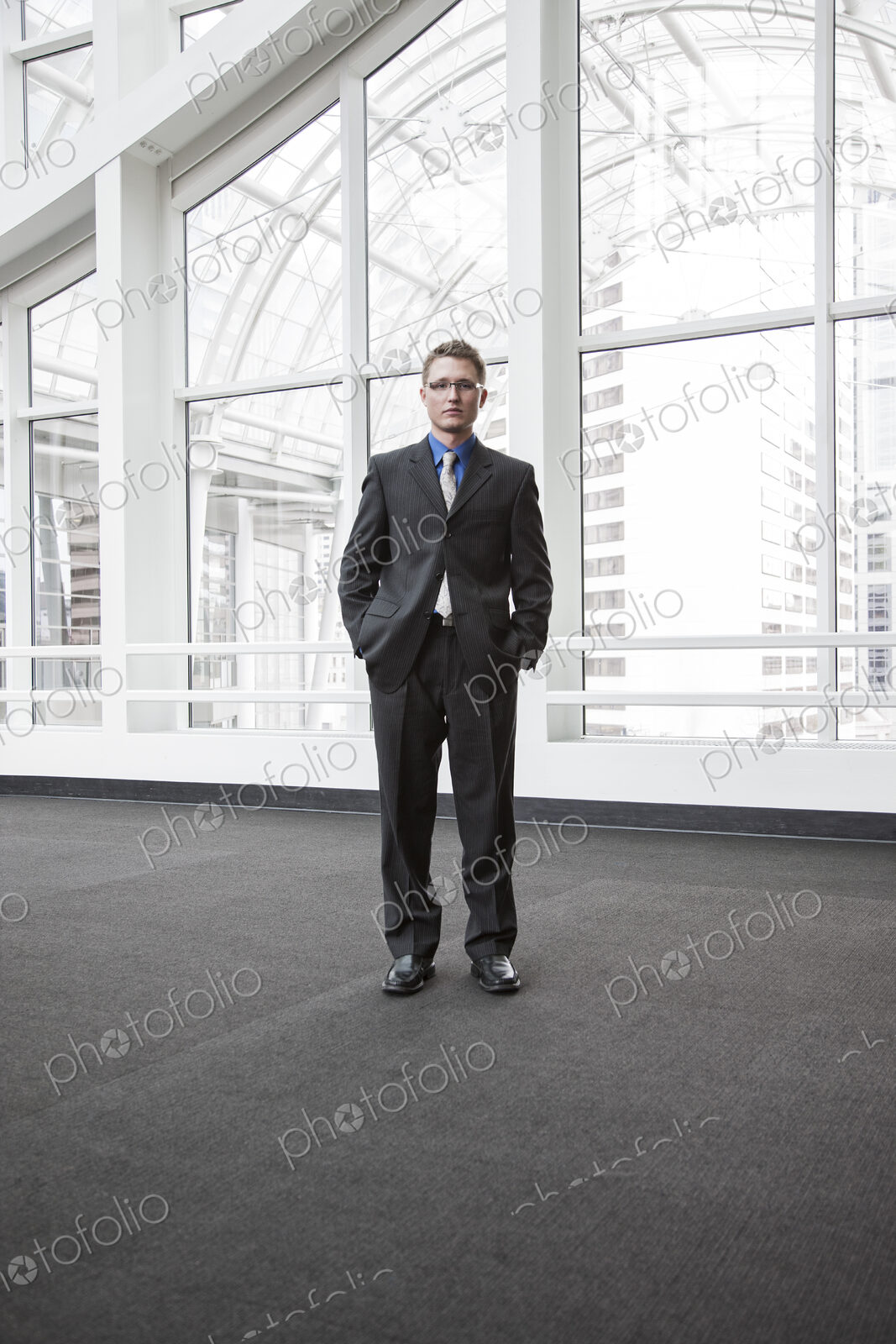 Portrait of a caucasian businessman at a convention center space.