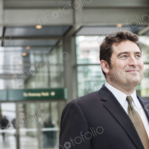 Portrait of a caucasian businessman at a convention center space. Portrait of a caucasian businessman at a convention center space.