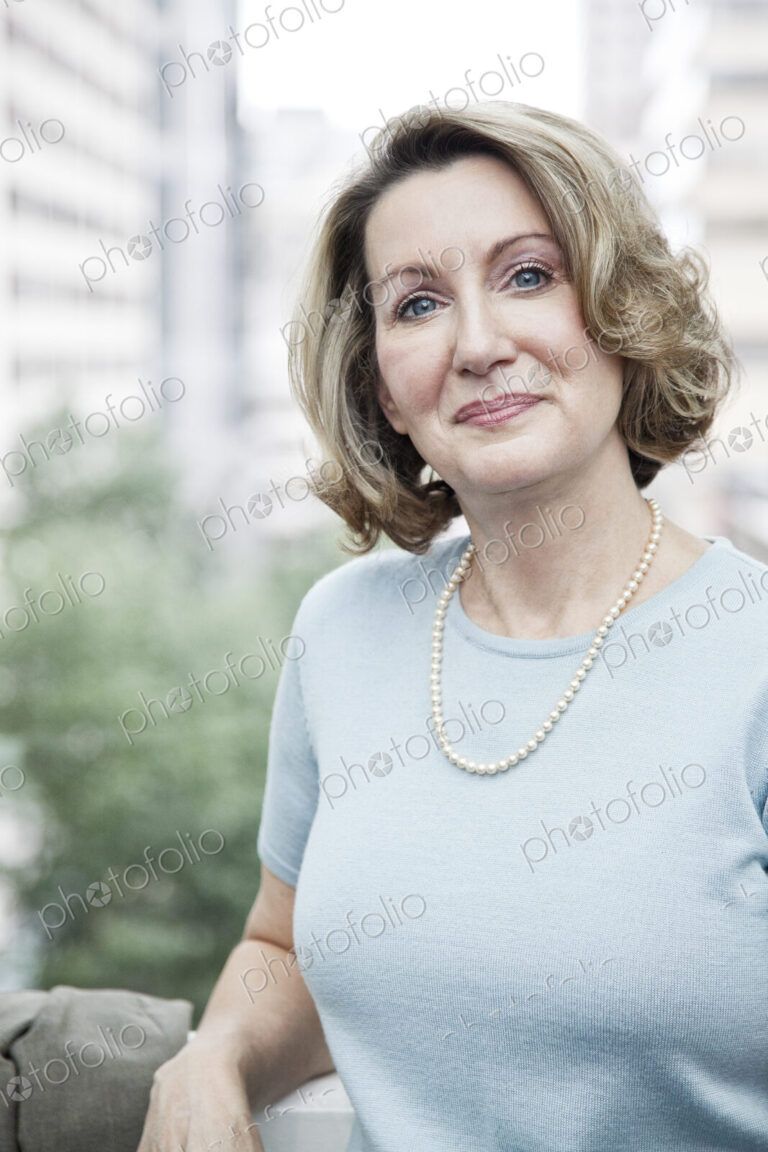 Portrait of a caucasian businesswoman in a convention center space.