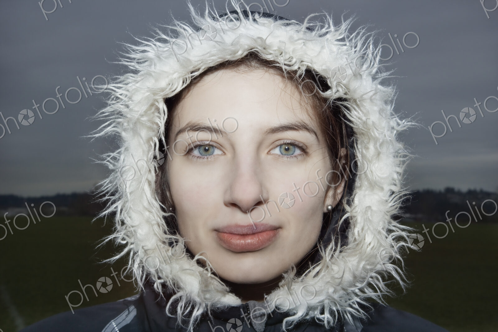 Portrait of a caucasian woman wearing a winter coat.