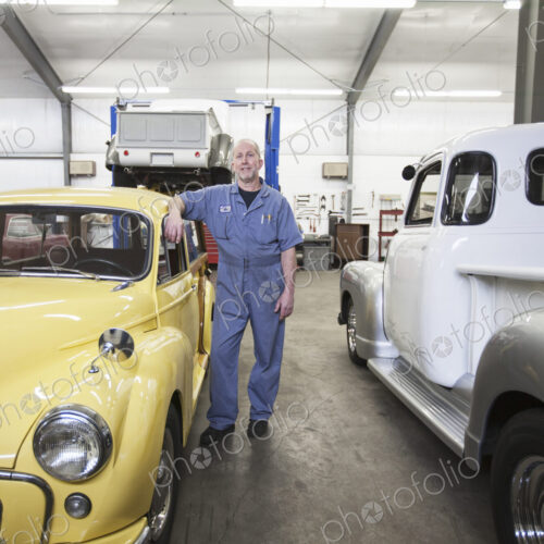 Portrait of a senior caucasian male owner of an antique car repair shop Portrait of a senior caucasian male owner of an antique car repair shop