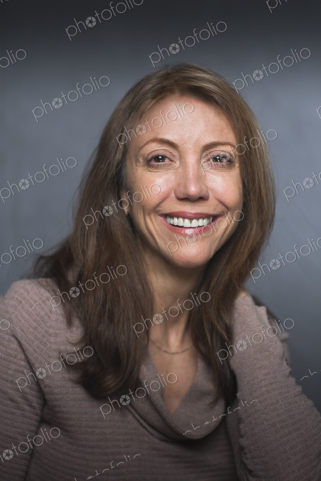 Portrait of a smiling middle aged woman.