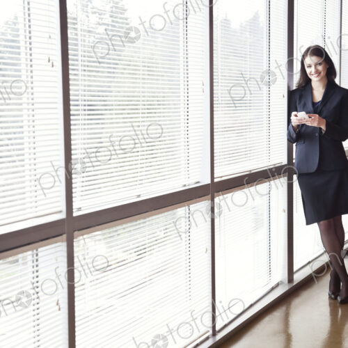Portrait of a young Caucasian woman in an office.