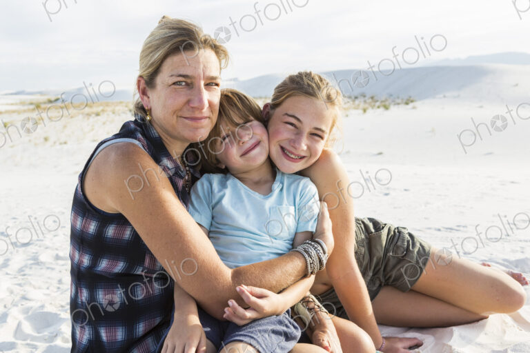 Portrait of mother and her children, White Sands Nat'l Monument, NM