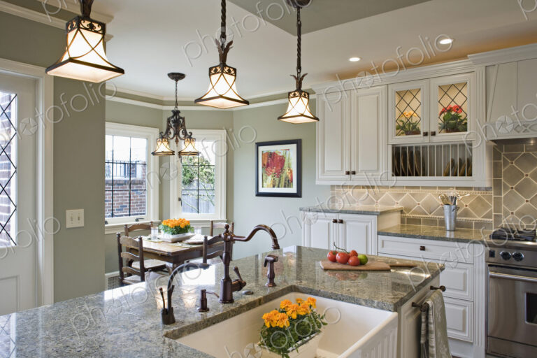 Potted plant in sink of luxury kitchen