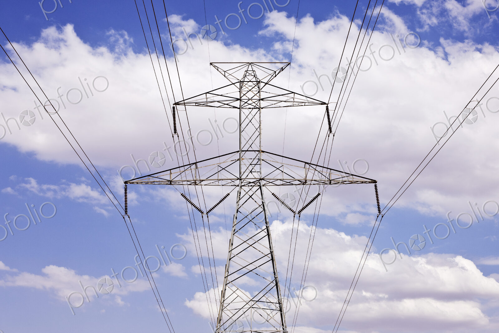 Power Pylon Under Clouds