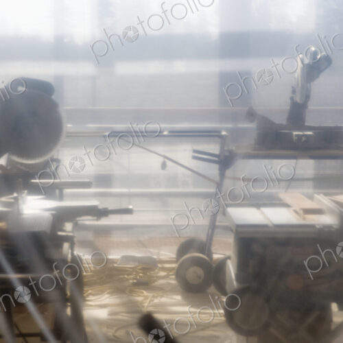 Power Tools Behind Plastic Sheet