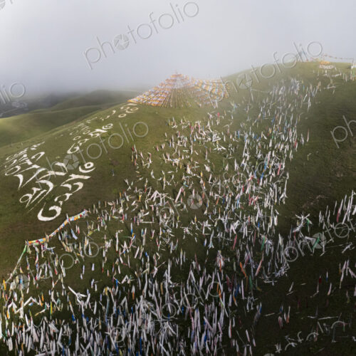 Prayer Flags on the Side of a Hil on a Misty Morning Tagong, Sichuan Province, Kham Tibet,