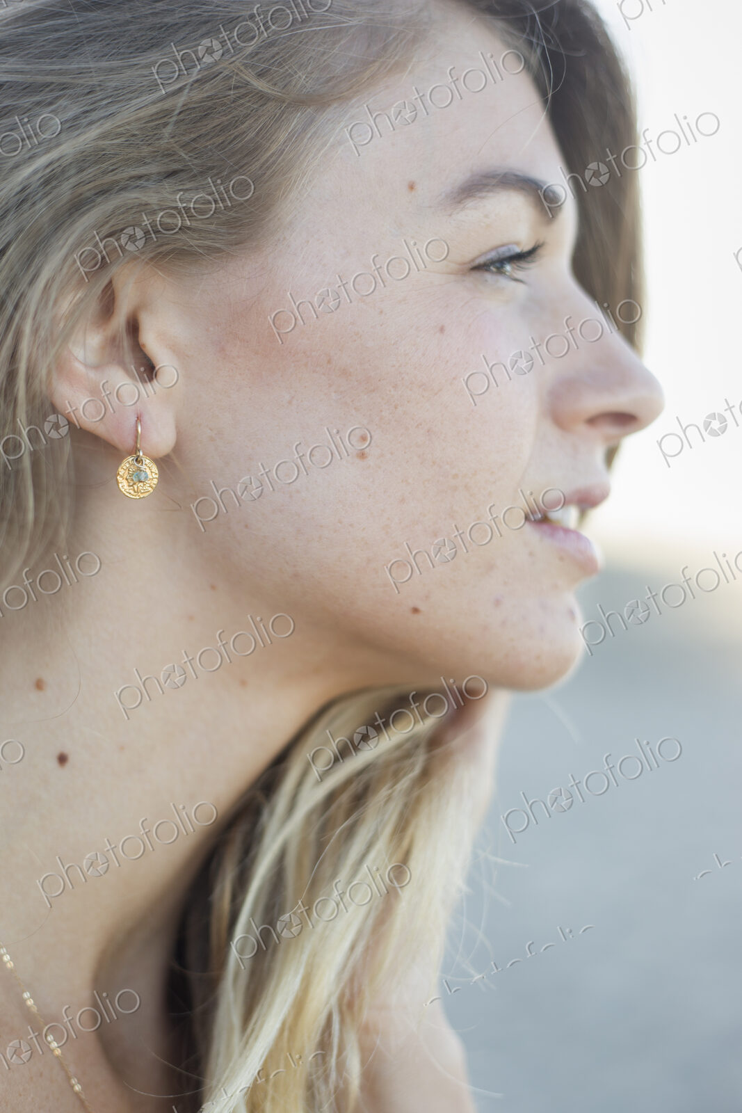 Profile portrait of a blond woman.