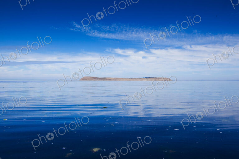 Protection Island, Puget Sound, view from a distance over calm seas.