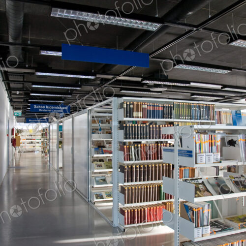 Public library, modern interior with shelves of books Public library, modern interior with shelves of books