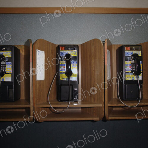 Public phone booths at a highway rest stop in West Virginia