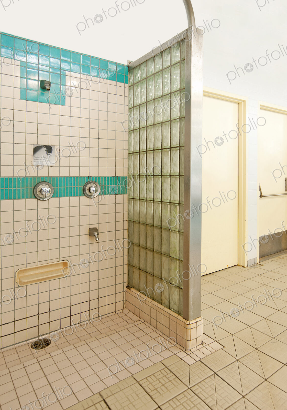 Public showers in a swimming pool.