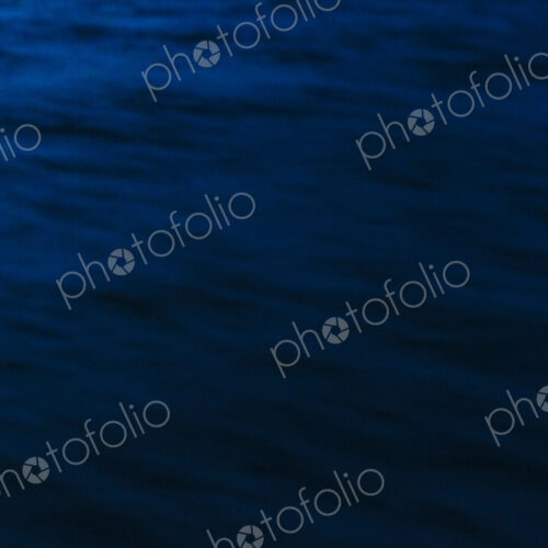 Puget Sound at dusk, motion blurred water surface. Puget Sound at dusk, motion blurred water surface.