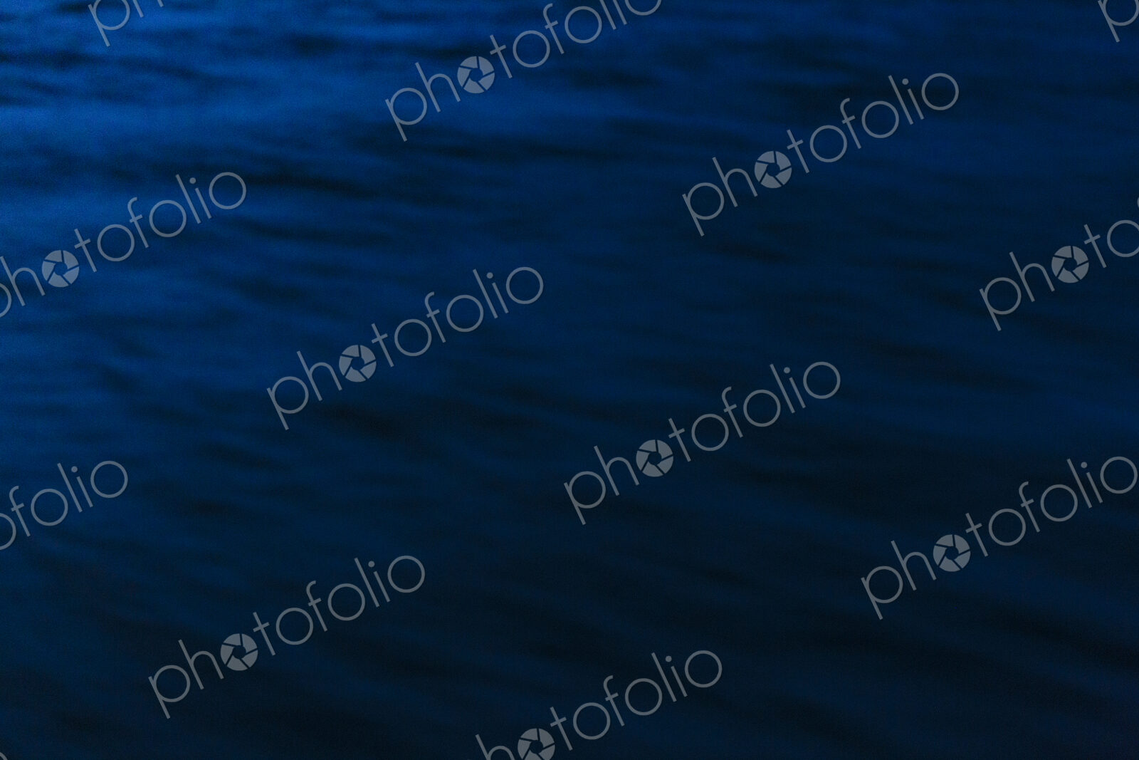 Puget Sound at dusk, motion blurred water surface.