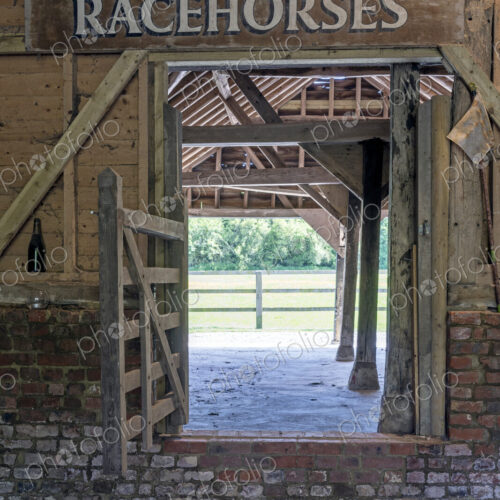 Racehorse sign over farm stable Racehorse sign over farm stable