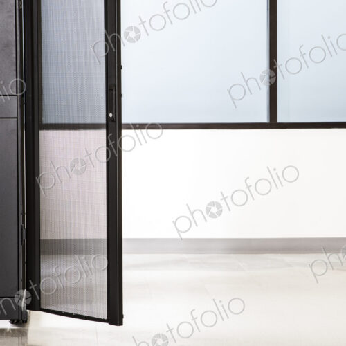 Rack housing servers in computer server farm
