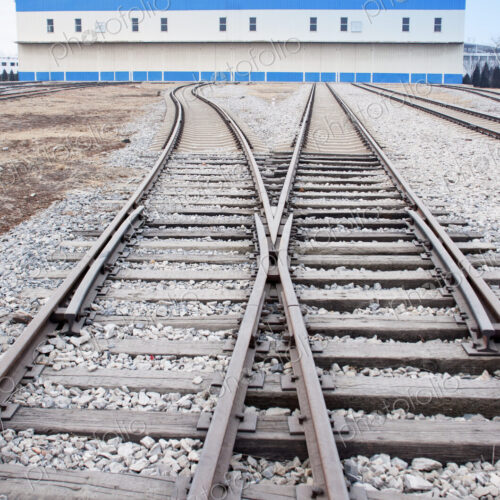 Railway shed with blue roof and sidings. Railway shed with blue roof and sidings.