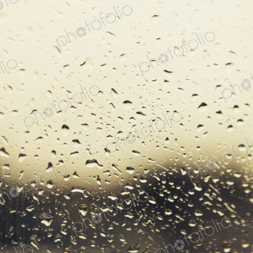 Rain water droplets on a window. View through the window on a rainy day. Seattle Rain water droplets on a window. View through the window on a rainy day. Seattle