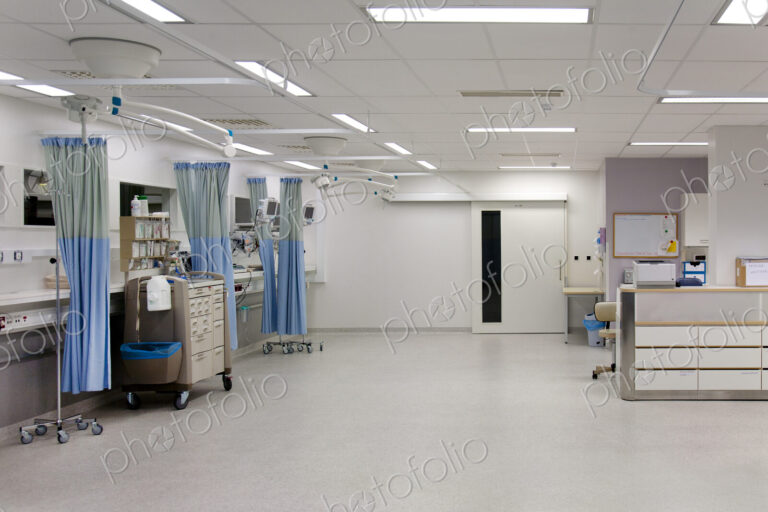 Recovery room in a modern hospital, post-operative recovery, patient bays with curtains