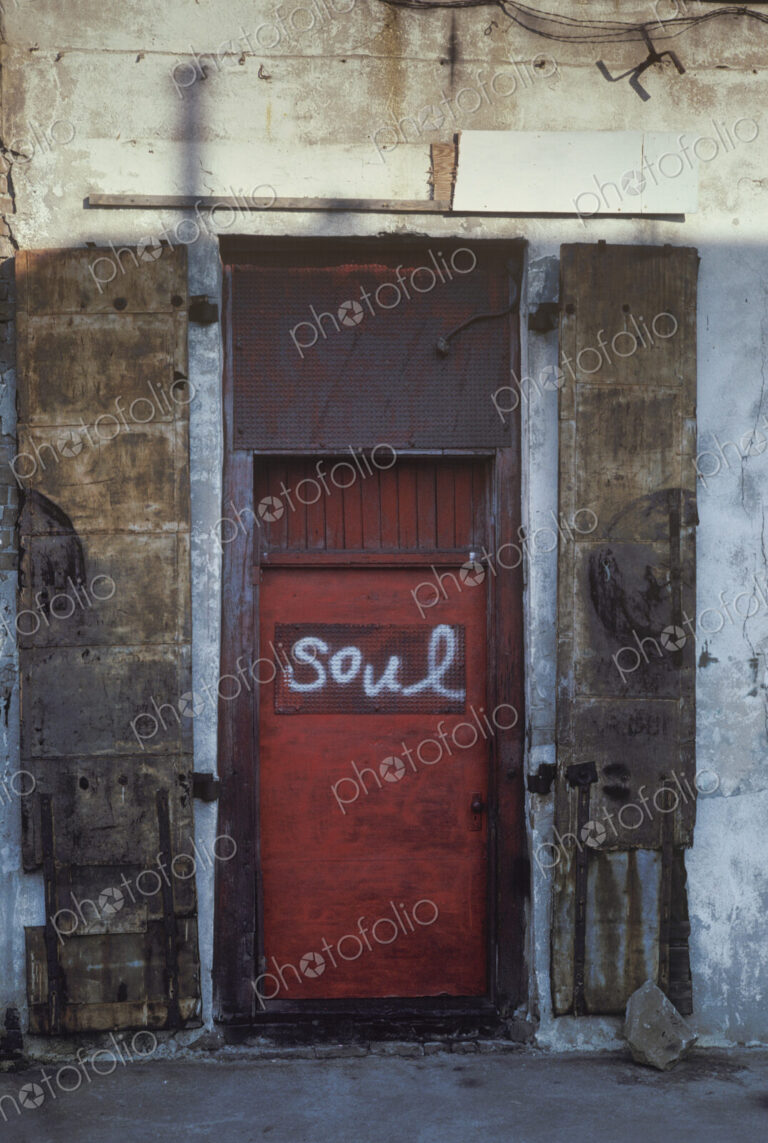 Red Door with Graffiti