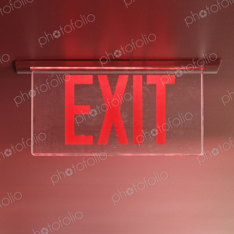 Red Exit Sign on Ceiling