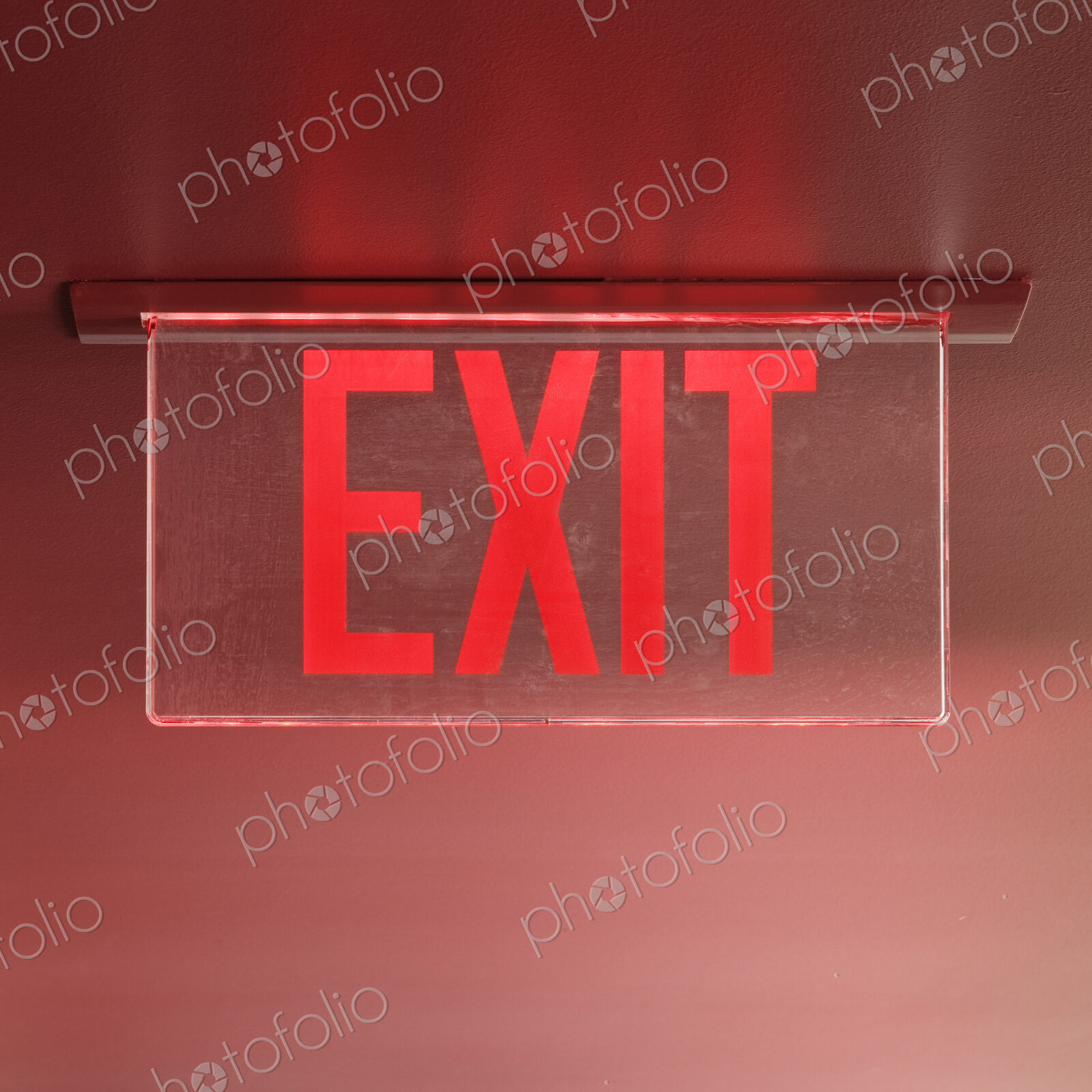 Red Exit Sign on Ceiling