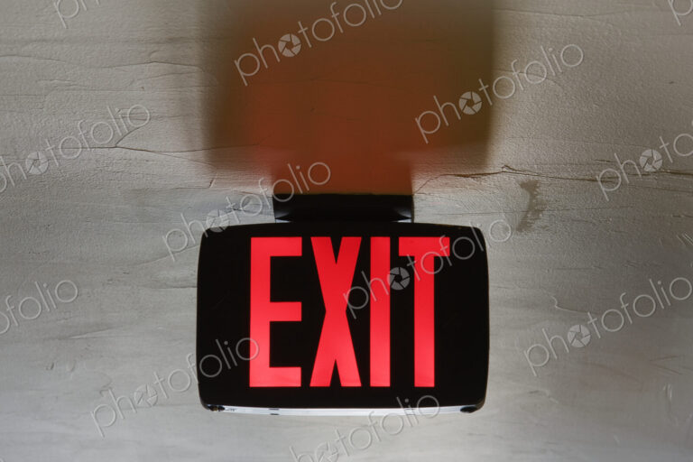 Red Exit Sign on Ceiling