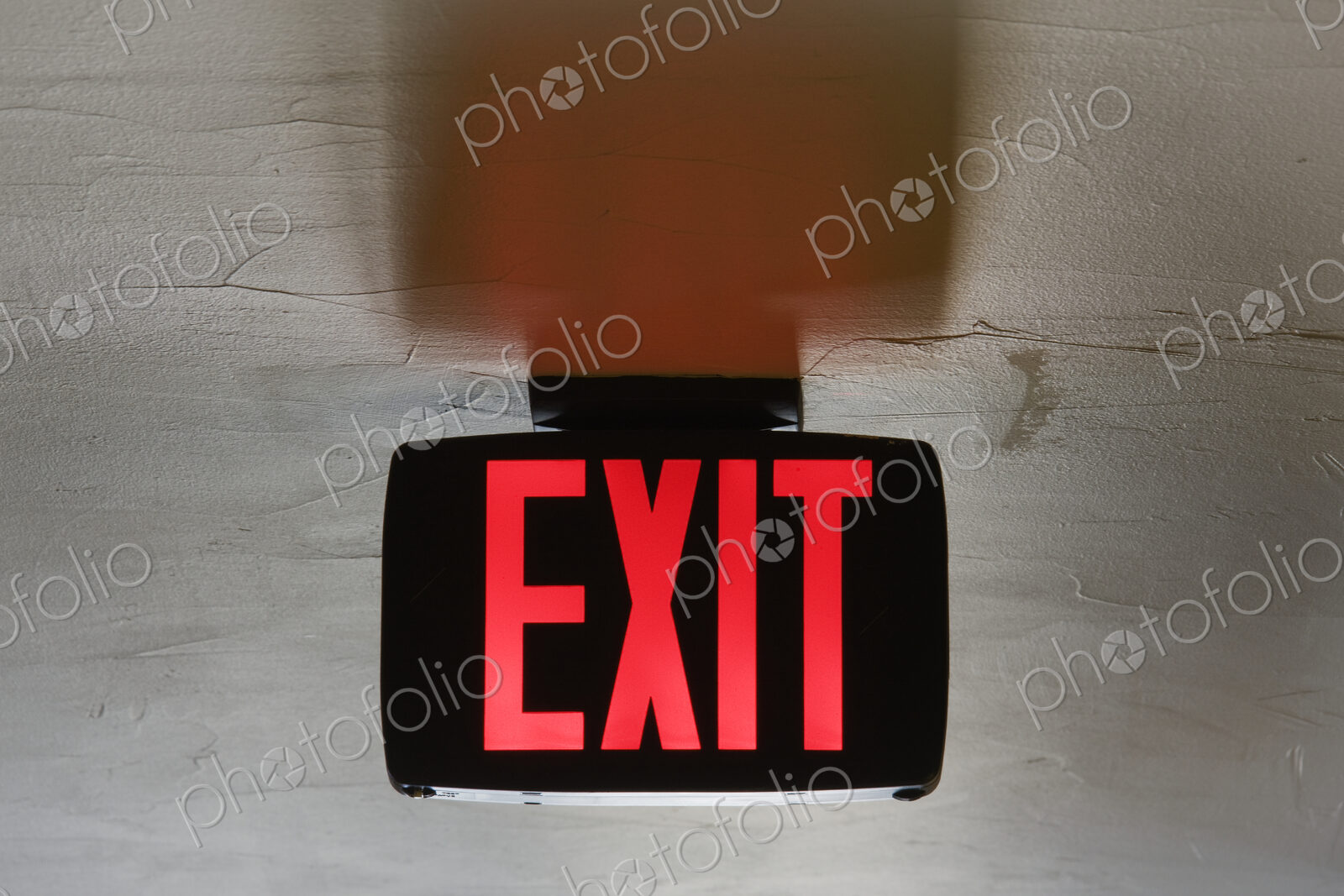 Red Exit Sign on Ceiling