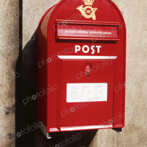 Red Postbox Mounted on Wall