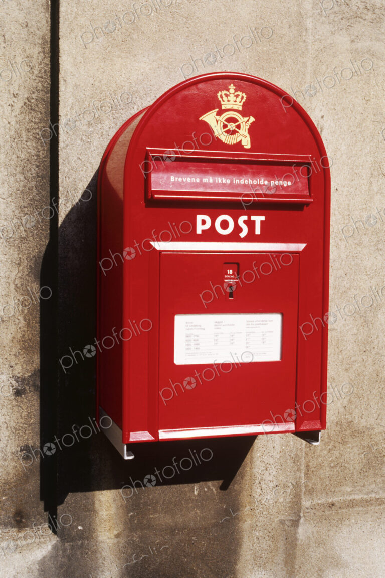 Red Postbox Mounted on Wall
