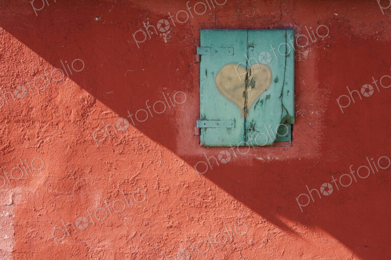 Red Wall with Shuttered Window