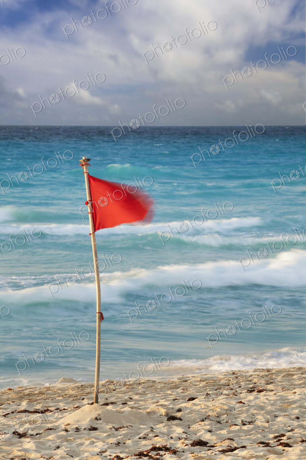 Red flag on tropical beach in hotel zone, Cancun, Yucatan Peninsula, Quintana Roo, Mexico