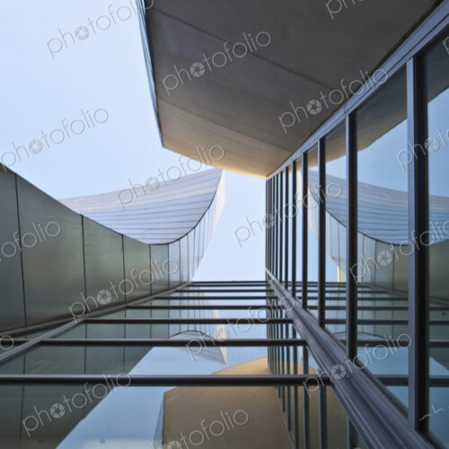 Reflection in the Windows of a Modern Office Building Reflection in the Windows of a Modern Office Building