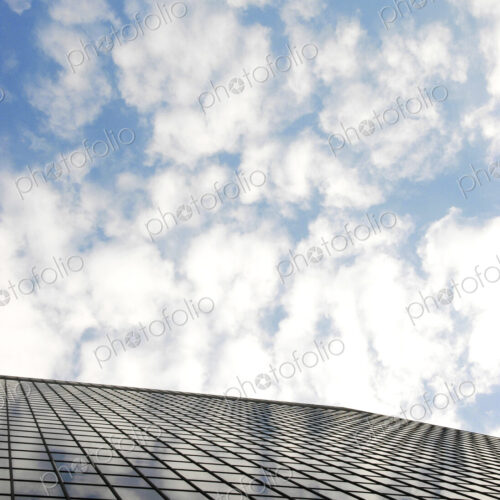 Reflection of clouds on highrise window